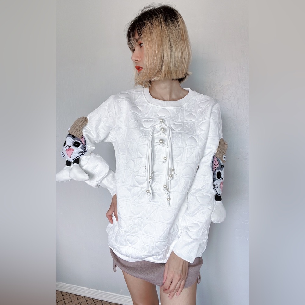 BRAND NEW! White sweater with a cute cat on sleeves
